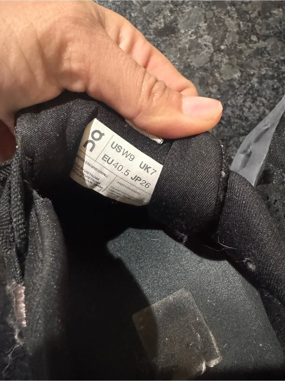 On Running Women’s Black Athletic Lace-Up Running Shoes with Subtle Pink Accents